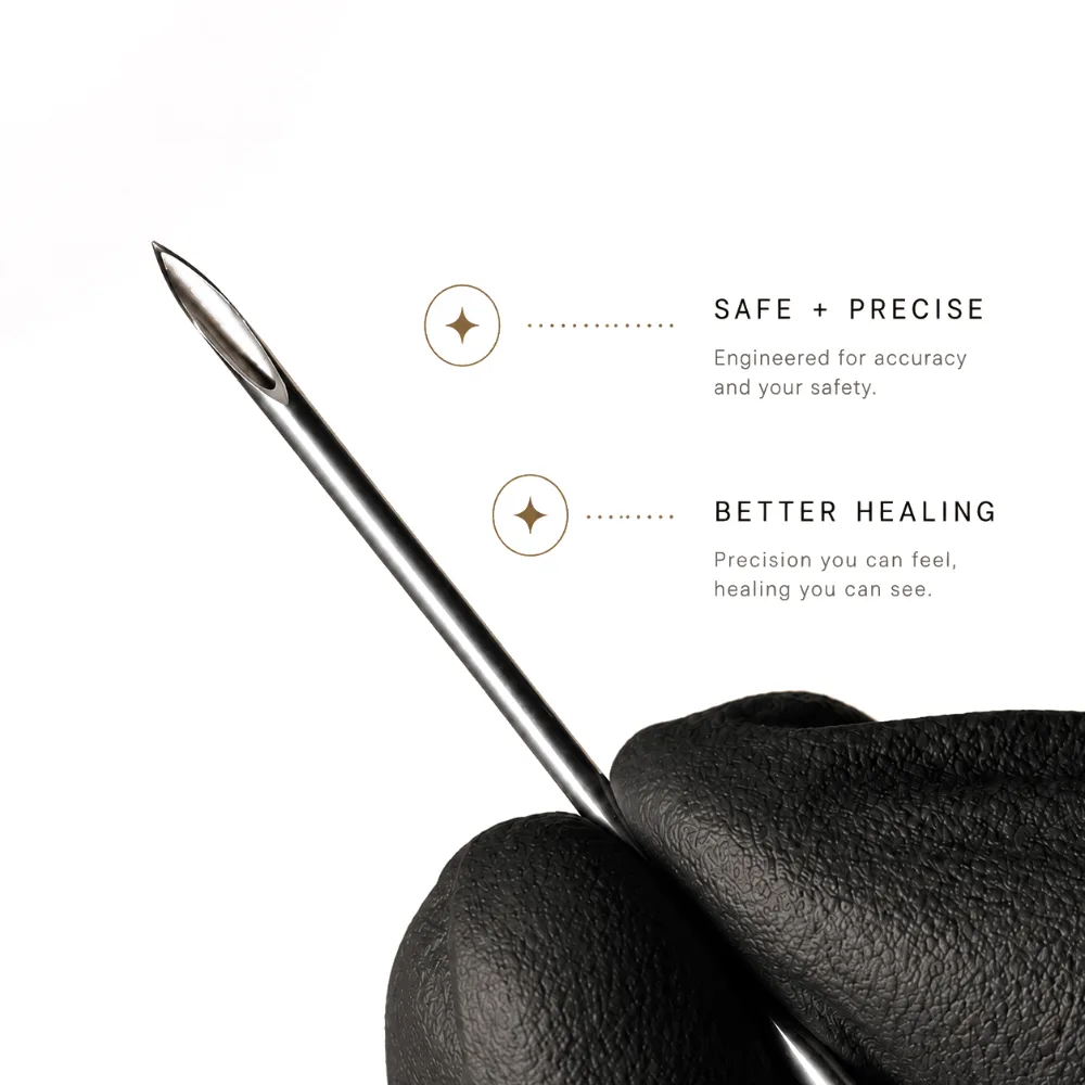 Single-use piercing needle held in a gloved hand, safe, precise, better healing