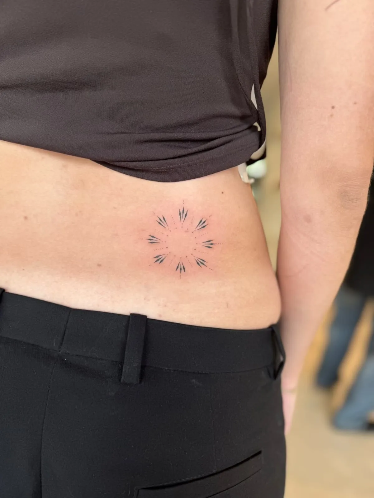 Blackwork & geometric ornamental tattoo on the arm
