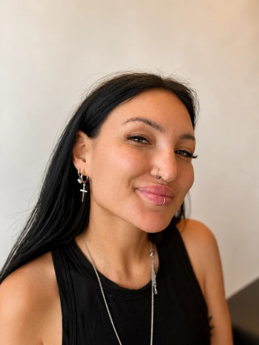 Lip piercing with a fine silver hoop