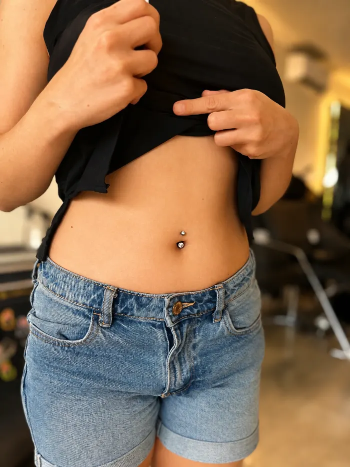 Navel piercing healed on a client