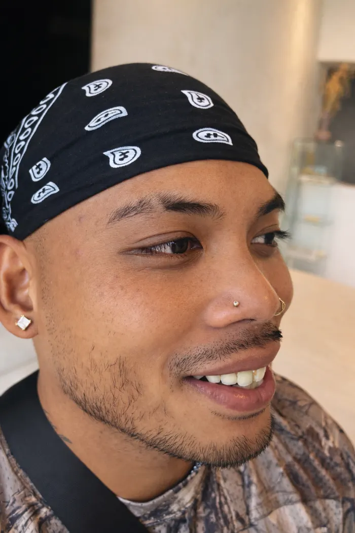 Nostril piercing healed on a client