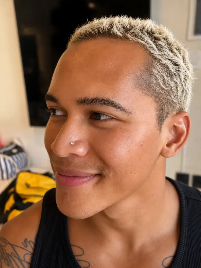 Nostril piercing healed on a client