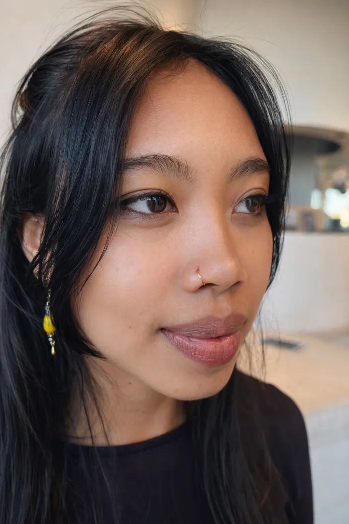 Nostril piercing healed on a client