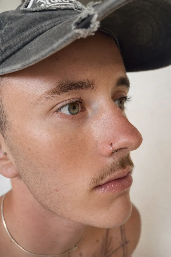 Nostril piercing healed on a client