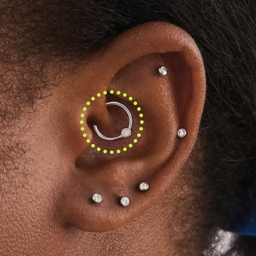 Daith piercing with a curved barbell