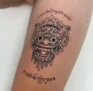 Realism portrait tattoo on the leg